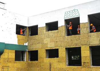 В новых регионах России восстановлено свыше 6 тысяч многоквартирных домов